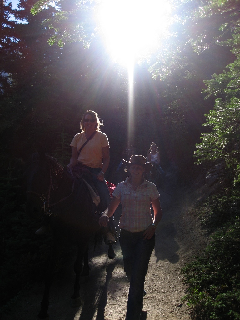 horseback riders \n (Click for next picture)